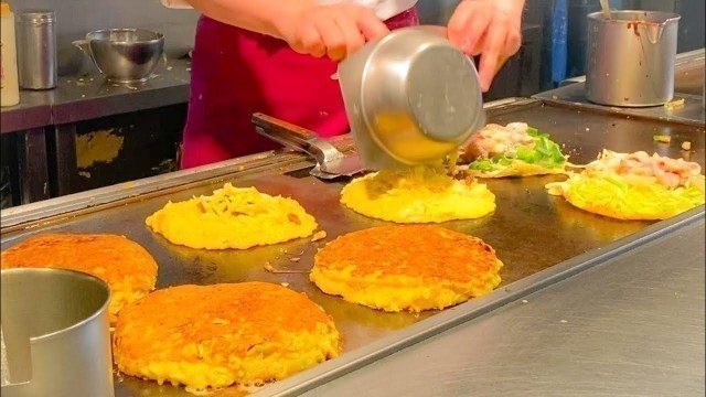 'japanese street food - egg bacon, okonomiyaki, yakisoba (dotombori osaka)'