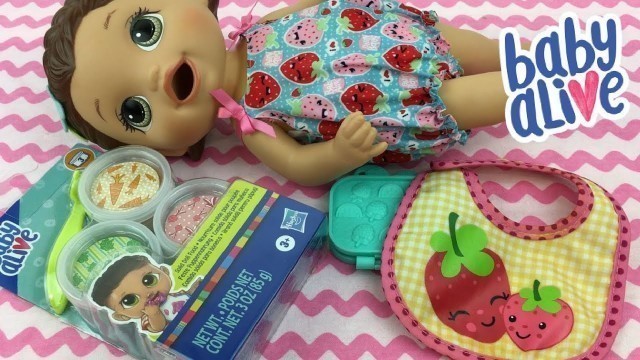 'Feeding Baby Alive Super Snackin Lily Red Doll Food'