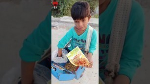 'small child selling street food 