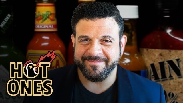 'Adam Richman Impersonates Noel Gallagher While Eating Spicy Wings | Hot Ones'