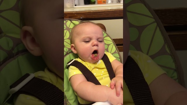 'FUNNY 6 month old baby eating avocado'