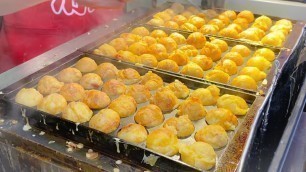 'japanese street food - TAKOYAKI ( dotombori osaka )'