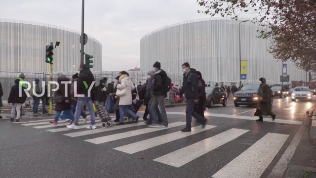 'Italy: Long queues form outside Milan food bank ahead of Xmas amid COVID economic fallout'