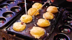 'Japanese Street Food - BLACK OCTOPUS BALLS Ninja Takoyaki Osaka Japan'