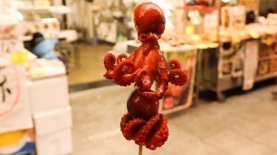 'Japanese Street Food - Baby Octopus Kuromon Osaka Japan'