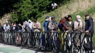 'On the margins of Paris, the food bank queues grow longer'