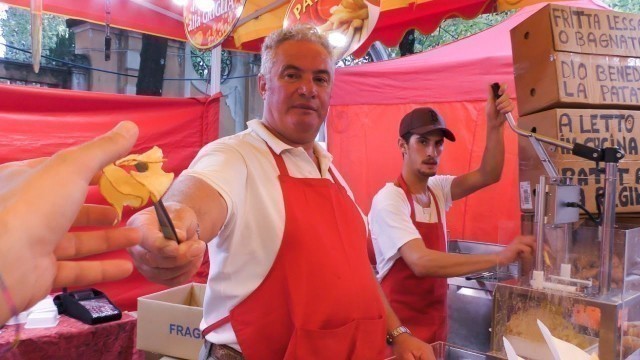 'Italy Street Food. Twister Chips Machine and Grilled Cob'