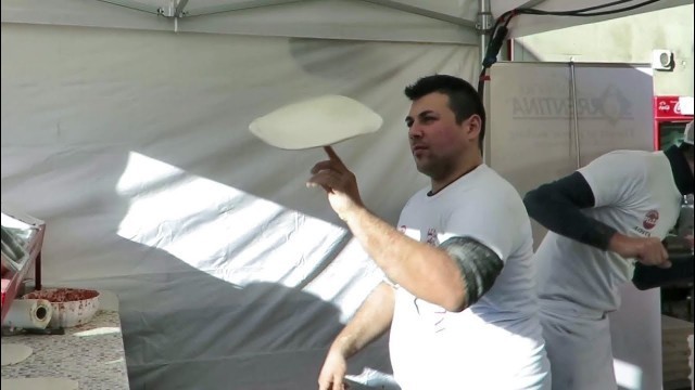 'Acrobatic Pizza Maker Seen in Italy. Classic Pizza form Naples. Italian Street Food'