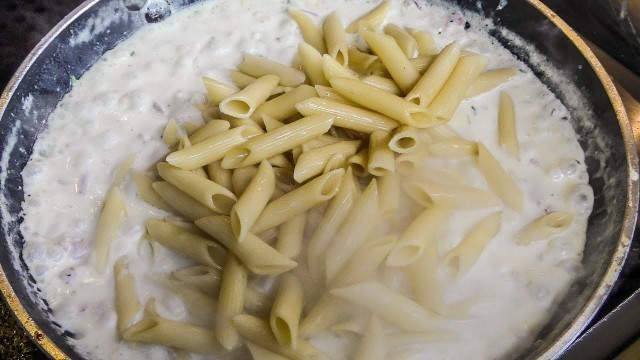 'Italian Pasta \"Carbonara\" and \"Pesto Sauce\" Cooked in Camden Town. Street Food of London'