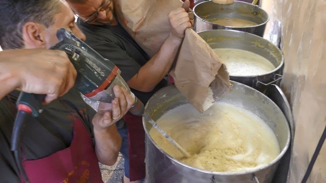 'Italy Street Food. Cooking the  \'Farinata\', Chickpea Flour Pancake'