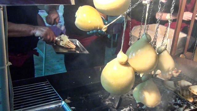 '\'Caciocavallo\' Cheese on Grill and on Charcoal. Italian Street Food'