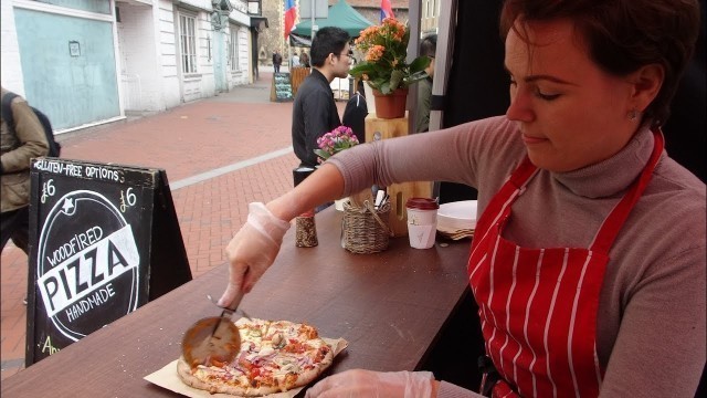 'Delicious Italian Street Food by \"Woodfired Pizza Handmade\" on a mobile cycle oven in Reading Market'