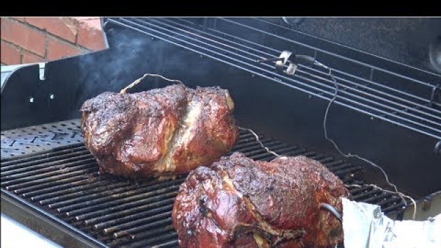 '2 Pork Butts Smoked on a Weber Genesis II.  In multiple thunderstorms.'