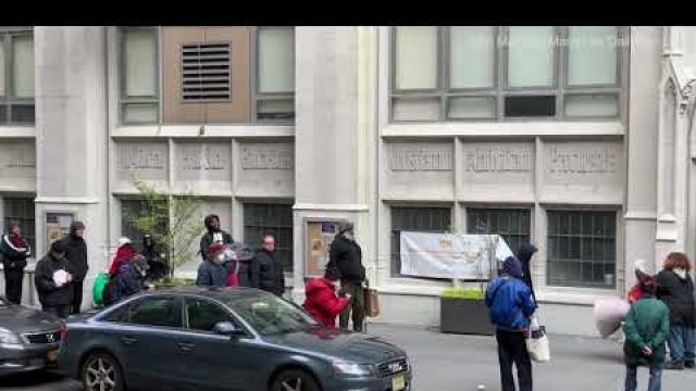 'People queue for for Easter lunch at food pantry in NYC'