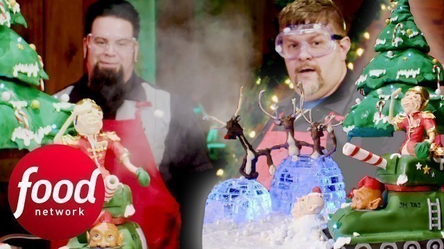 'Bakers Create A Cake Battle With A Snowball Throwing Tank And Ice Igloos | Santa\'s Baking Blizzard'