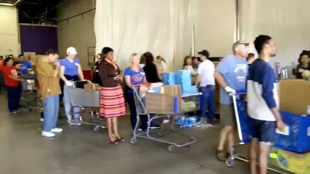 'Rocky Mountain Gator Club at Food Bank of the Rockies for International Gator Day - Food Cart Queue'