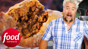 'Guy Fieri Can\'t Get Enough Of This Spicy Sausage Meat Pie! | Diners, Drive-Ins & Dives'